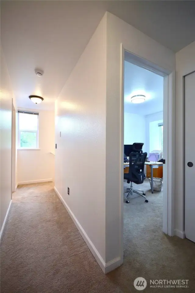 Stairway and hallway to all the up stairs rooms.