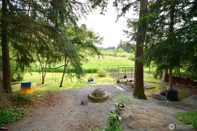 View from the deck fire pit picnic area and plenty of room to play.