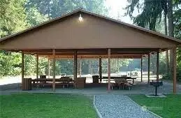 Cabanas ready for parties, BBQ's  equipped with picnic benches.