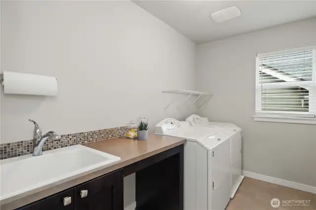 Utility room with sink