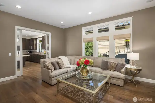 A versatile family room connects to the great room, providing a private space to unwind and relax.