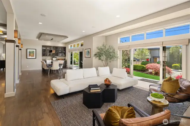 The thoughtfully designed main floor features an open, flowing layout ideal for entertaining, with generous gathering spaces that transition effortlessly to both the front and back yards—perfect for indoor-outdoor living.