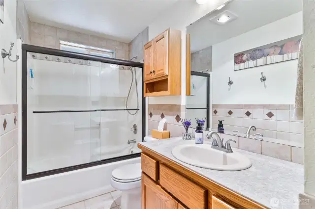 Bright and updated main bathroom right off the hallway