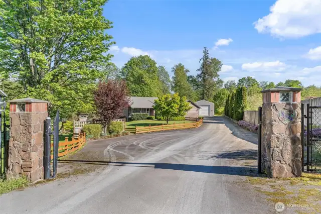 Long Paved & Gated Driveway – Privacy and Curb Appeal in One!