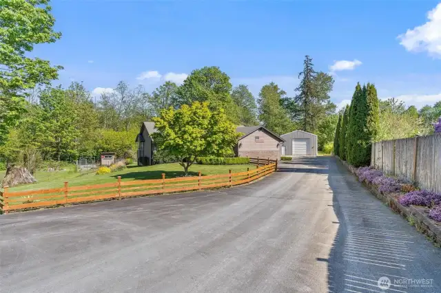 Long driveway to your home and HUGE shop!
