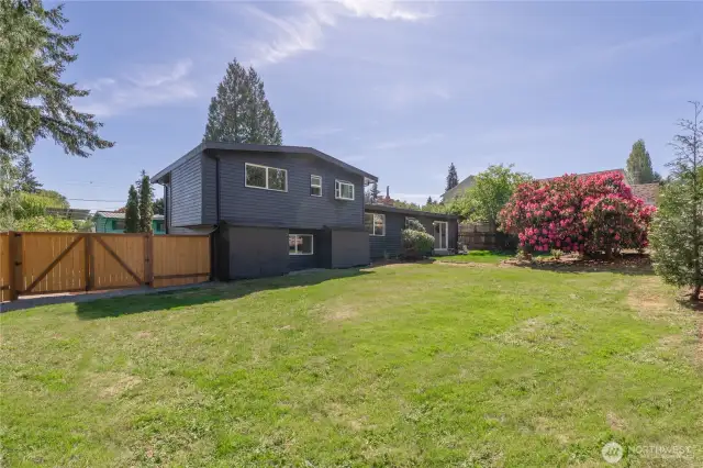 This home was wisely built toward the front of a large lot (nearly 1/4 acre), meaning the fully fenced backyard is substantial!