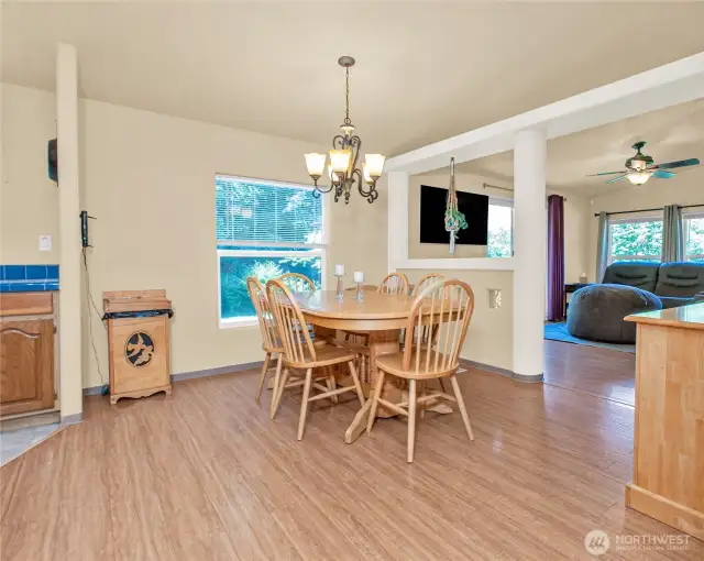 The charming dining area is perfectly positioned for effortless entertaining or simply enjoying a quiet meal at home."Lovely dining area conveniently located for ease of entertaining or just enjoying a meal.
