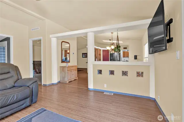 This home offers a thoughtful layout with a natural flow, providing distinct living spaces that balance comfort and functionality.