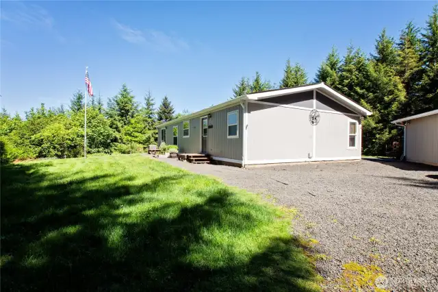 Ample parking has been thoughtfully added to this lovely home, making it easy to host guests or accommodate multiple vehicles.