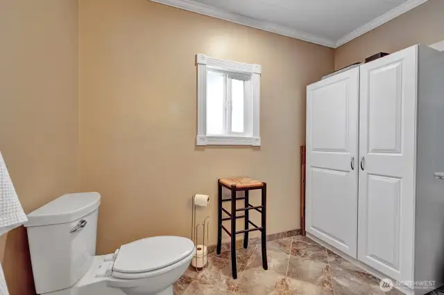 Storage cabinet in primary bathroom