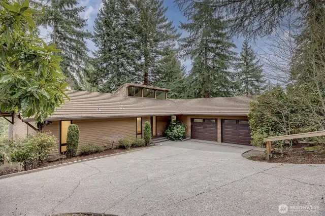 Step inside this remarkable home, where expansive spaces, abundant natural light, and breathtaking Cascade Mountain views create an atmosphere of warmth and sophistication.