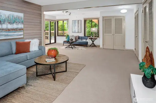 The lower level expands the home’s livability, offering a spacious rec room that serves as a perfect secondary living space.