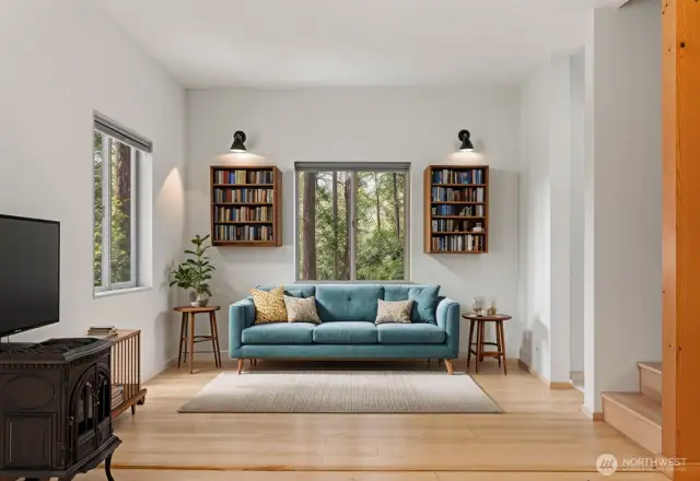 Stairs to upper floor seen here. This living room is virtually staged.