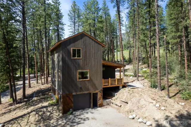 One car attached garage and deck off of kitchen.