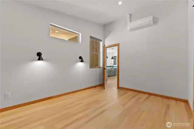 Primary bedroom off of kitchen.
