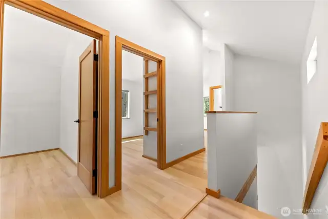 At top of stairs you can see the landing and entrance to mirror image upstairs bedrooms.