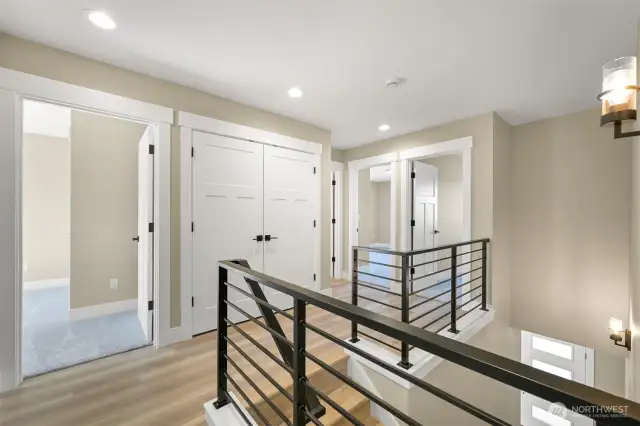 A large linen closet sits conveniently between the bedrooms