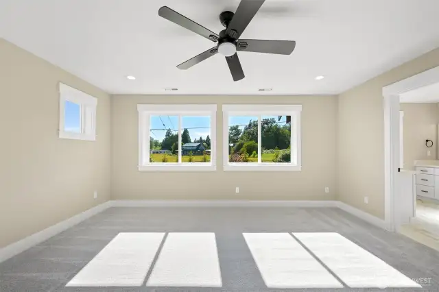 The primary bedroom & bathroom