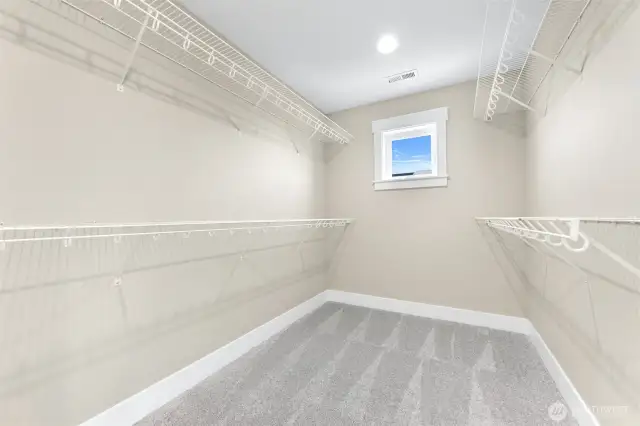 The primary bedrooms walk in closet