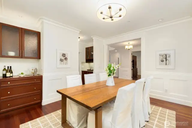 Note the wet bar area to the left - and the additional wet bar pictured in the top center of the photo. That space leads to the kitchen. There you'll also find the walk-in pantry in the same area leading to the kitchen.