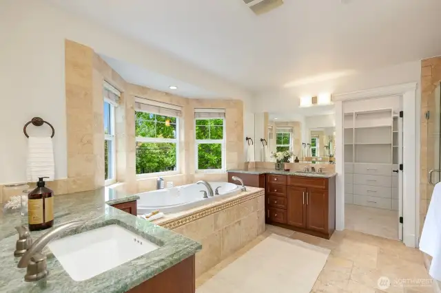 Primary bath. The water closet and walk-in shower are to the right in this photo. Heated floors here too!
