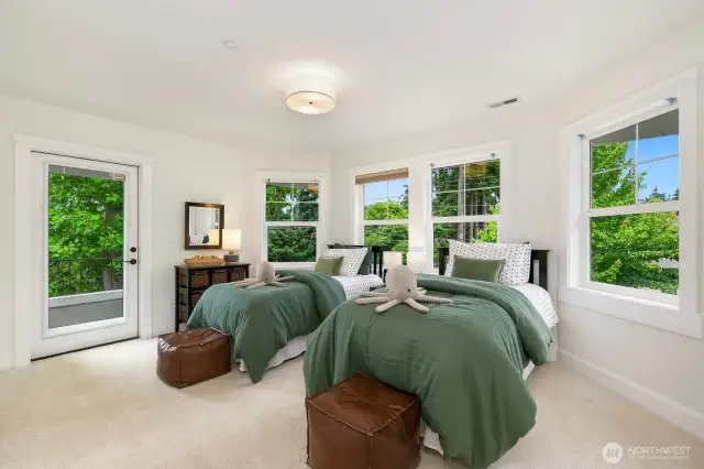 Upstairs bedroom (#2) also has it's own balcony.