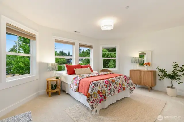 Upstairs bedroom (#3) on the opposite corner of the house. The corner windows are amazing!