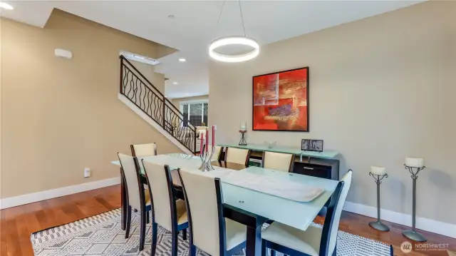 Formal dining room with maple hardwood floors.