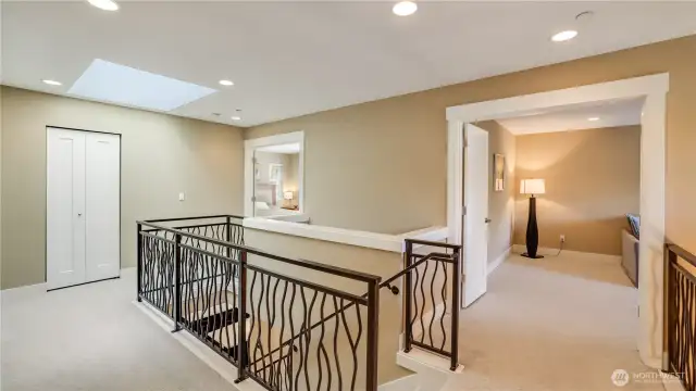 Newer high-end carpet double door entry into bonus room & primary bedroom. Skylight for more natural light.
