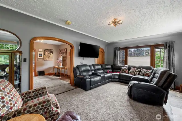 The 1928 Main floor living room is perfect for quiet conversation or seating your favorite guests to watch the game.