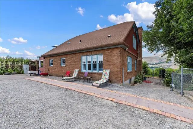 Wide open hardscape yard of the 1928 Tudor leaves room for play, or for realizing your dreams of designing your dream outdoor space.