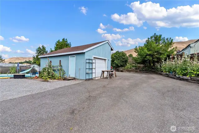 The garage off the 1928 Tudor home has been resided and re-roofed from the original.