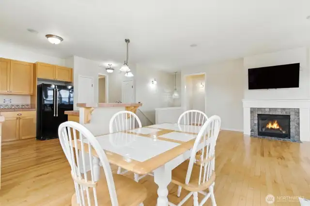 The casual eating area just off the kitchen is perfect for everyday meals, offering a comfortable and convenient spot that blends seamlessly with the home's open layout.