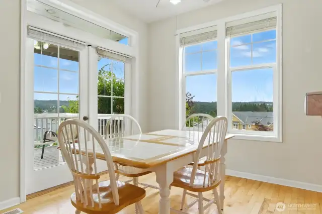 This home offers the flexibility of two dining areas—perfect for both formal entertaining and everyday meals. Pictured is the casual dining area, a comfortable space just off the kitchen that’s ideal for relaxed gatherings.