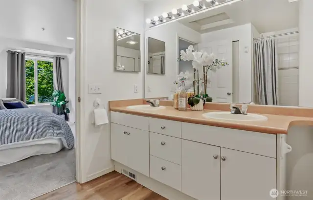 Large, full bathroom off the primary bedroom.  There are several closets in the bathroom for added storage.