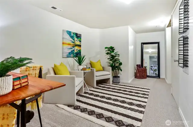 Bonus room on the lower level with new carpet and paint.  There is extra storage in this room.