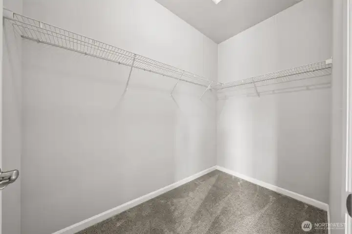 Primary suite XL walk-in closet.