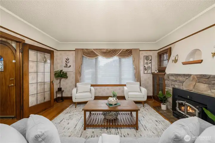 Wall sconces, glitter and glam in the fireplace surroundings, custom woodwork,