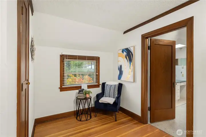 Sitting area w/wall pull out ironing board