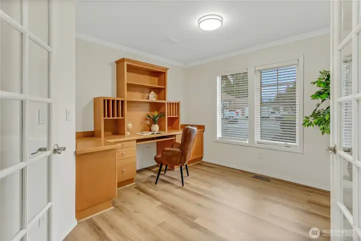 Making your way around the min level of the home is this spacious office/den with a French door entry. This is ideal for the “ work from home” situation or just a quiet sanctuary away from the main living spaces.