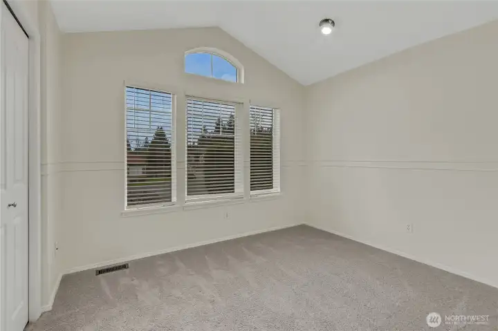 Another angle of the bonus room and windows which includes new blinds as well.