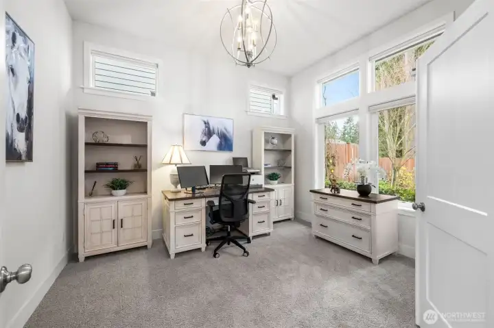 Den/home office located on main floor away from the main living areas.