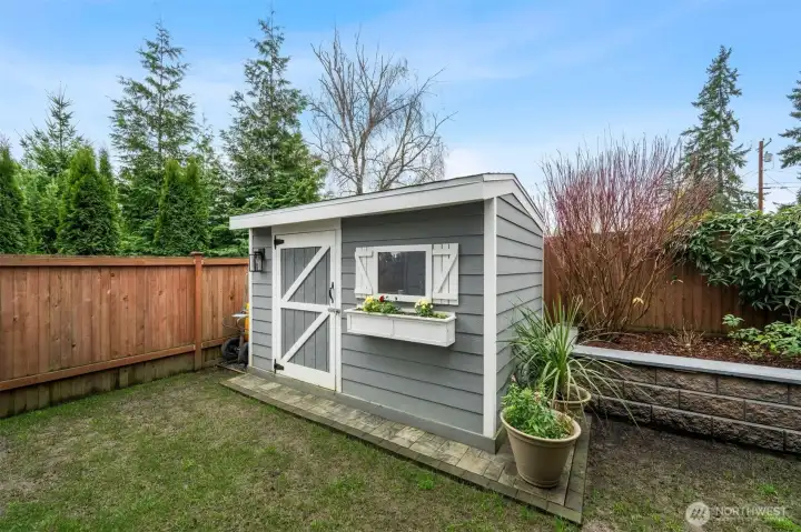 Cute garden shed for all your tools!