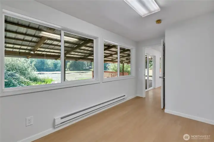 Bedroom 4 located downstairs w/waterfront view.