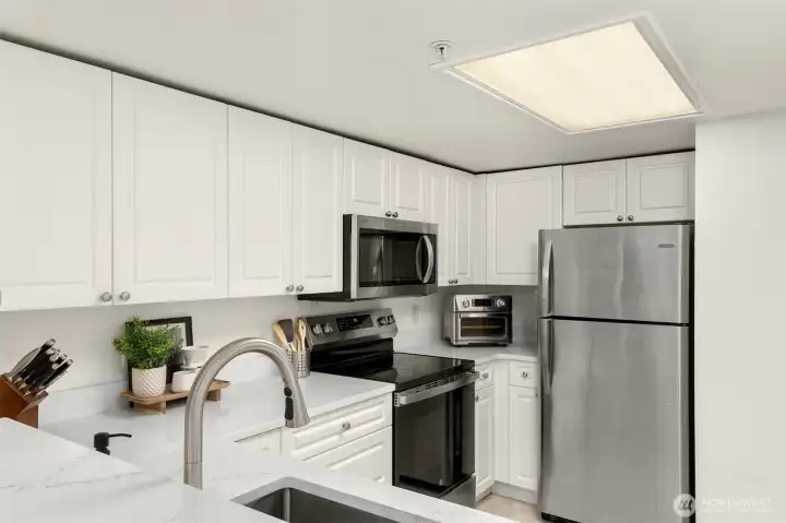 Newly updated quartz countertops in the kitchen.