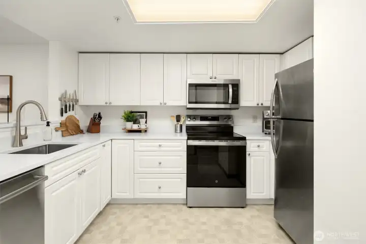 Spacious kitchen with plenty of storage and modern appliances.