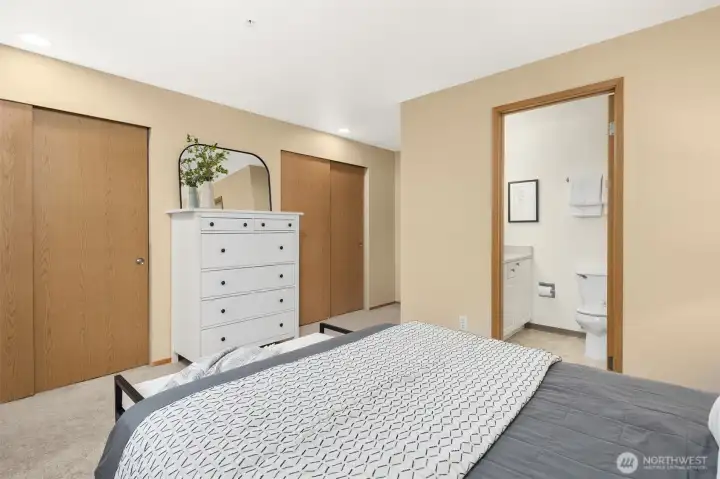 Two large closet spaces with built in shelving.