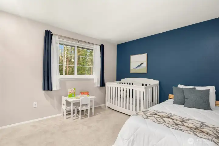 Second bedroom upstairs with deep closet for extra storage.