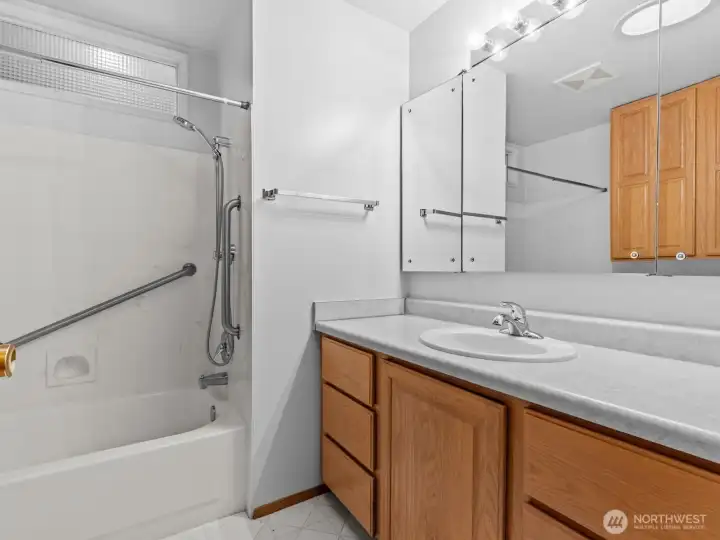 Just down the hall is the conveniently located bathroom.