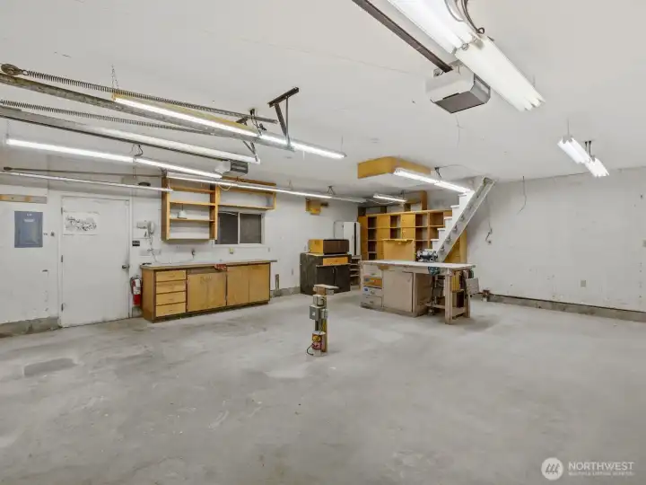 Keep on using the garage as a shop or cap the electrical to convert back to a usable garage.